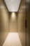 Elegant walk-in closet with spotlights