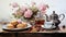 Elegant watercolor composition of a tea party spread, complete with teapot, cups