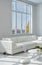 Elegant White Sofa Near the Glass Window