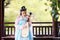 Elegant woman in Chinese traditional drama ancient costume play Chinese lute pipa guitar