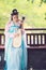 Elegant woman in Chinese traditional drama ancient costume play Chinese lute pipa guitar