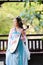 Elegant woman in Chinese traditional drama ancient costume play Chinese lute pipa guitar