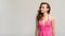 Elegant woman commercial background pink dress