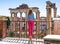 Elegant woman in front of Roman Forum exploring attractions