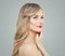 Elegant woman with long blonde curly hair, healthy skin and red lips makeup. Facial treatment, hair care and cosmetology concept