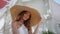 Elegant woman straw hat posing beautiful summer closeup. Portrait chic model