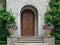 Elegant wood grain front door of stone house in round vestibule