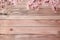Elegant Wood Texture Background Adorned with Soft Pink Cherry Blossoms
