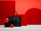 Elegantly arranged black handbag on red background, store window for black Friday