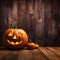 Elegantly arranged small pumpkins and one large jack-o-lantern glowing against wooden boards, a banner and space for your own