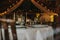 Elegantly decorated dining table set up for a wedding dinner at a ranch.