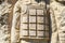 Element of a monument to a soldier, body armor close-up. Background with copy space