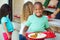 Elementary Pupils Collecting Healthy Lunch In Cafeteria