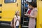 Elementary Students Boarding School Bus