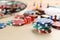 Elements of different board games on wooden table, closeup