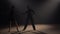 Elements of passionate Argentine tango performed by a pair of dancers. Silhouettes man and a woman are dancing a latin