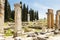 The elements of the wall of a ruined ancient house. Beautiful background of the ruins of Greek cities.