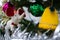 Elephant christmas decoration hanging on a christmas tree with green bauble and blurred christmas pudding