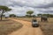 Elephant close to safari car and photographer at Tarangire national park in Tanzania.