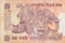 Elephant Rhinoceros and tiger depicted on Indian bank note ten rupees. 10 Rupee National currency of India INR