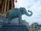 Elephant sculpture at Ruen Yod Barom Mungkalanusaranee pavilion under bright blue sky