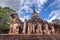 Elephant statue around pagoda at ancient temple Wat Chang Lom at Srisatchanalai historical park, Sukhothai, thailand