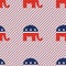 Elephants seamless pattern on red and blue.