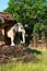 Elephants statues on ruins of Buddhist temple.