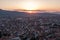 Elevated cityscape view of the city of Prizren, Kosovo, during sunset on a summer day.