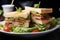 Elevated dining club sandwich displayed on a stylish black surface