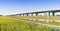 Elevated highway built built along a river with reinforced prefabricated concrete structure Italy -panoramic view