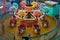 Elevated illuminated air balloon carousel indoor playground