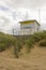 An elevated lifeguard tower on the sand dunes at Benone beach on the north coast of ireland in county Londonderry shut up for the
