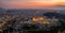 Elevated, panoramic view to the illuminated Parthenon Temple at the Acropolis, Athens