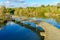 Elevated pathway over a pond, wetland nature reserve En Afek