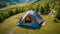 Elevated Serenity: Man Hiker Relaxing Around Camping House in Aerial View