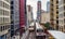 Elevated Train Tracks above the streets and between buildings at The Loop - Chicago, Illinois