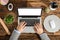 Elevated View Of A Businessperson Using Laptop