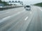 Elevated view over the front driving white van