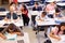 Elevated view of teacher and kids in elementary school class