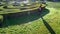 Elevated view of woman in english garden maze buxus