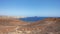 Elevated views of the arid volcanic landscape surrounding the summit of Montana Amarilla, Costa del Silencio, Tenerife, Spain