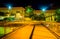 Elevated walkway and the Convention Center at night in Baltimore