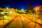 Elevated walkway and the Convention Center at night in Baltimore