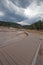 Elevated walkway leading to Firehole Lake in the Lower Geyser Basin in Yellowstone National Park in Wyoming USA