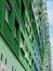 Elevation detail of re-insulated green abstract building