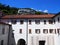 Elevation of white medieval courtyard of Madonna del Sasso church in Locarno city on Lake Maggiore in Switzerland