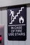 elevator sign in case of fire use stairs with figure, stairs, fire icons
