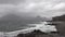 Elgol beach at Port na Cullaidh with Red Cuillin Mountains under clouds on Loch Scavaig Scottish Highlands Isle of Skye