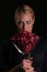 Eli holds a Giant Martini Glass Filled with Hot Pink Bougainvillea flowers